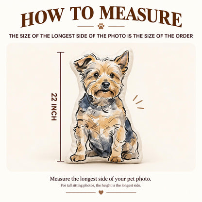 A custom-shaped throw pillow featuring a watercolor-style illustration of a sitting Yorkshire Terrier. The text reads HOW TO MEASURE, THE SIZE OF THE LONGEST SIDE OF THE PHOTO IS THE SIZE OF THE ORDER, 22 INCH, and Measure the longest side of your pet photo.
