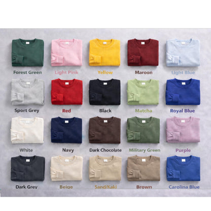 A collection of twenty crewneck sweatshirts displayed in a grid, featuring various solid colors including forest green, light pink, yellow, maroon, light blue, sport grey, red, black, matcha, royal blue, white, navy, dark chocolate, military green, purple, dark grey, beige, sand, brown, and carolina blue.