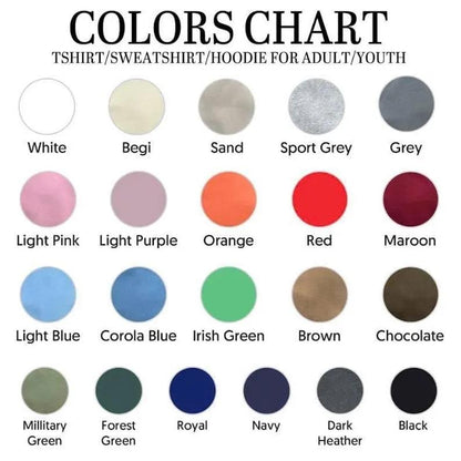 A color chart for t-shirts, sweatshirts, and hoodies featuring twenty-five circular color swatches with labels including white, begi, sand, sport grey, grey, light pink, light purple, orange, red, maroon, light blue, corola blue, irish green, brown, chocolate, millitary green, forest green, royal, navy, dark heather, and black.