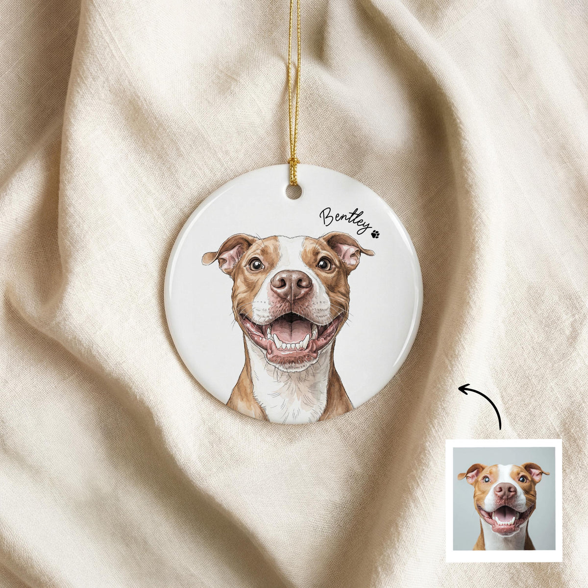 A round white ceramic ornament featuring a detailed illustration of a brown and white pit bull dog with an open-mouthed smile. The name Bentley is printed in black script above the dog, accompanied by a small black paw print icon.