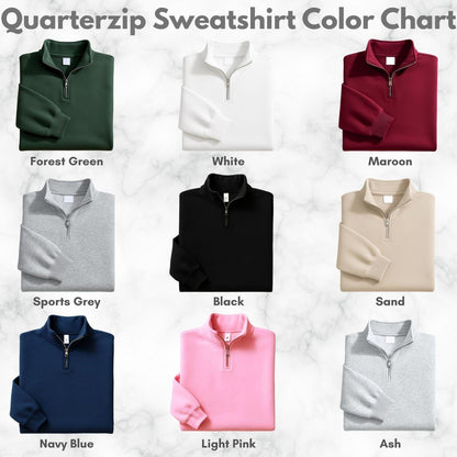 A Quarterzip Sweatshirt Color Chart displaying nine long-sleeve sweatshirts with quarter-length metal zippers. Colors include forest green, white, maroon, sports grey, black, sand, navy blue, light pink, and ash, each labeled below.