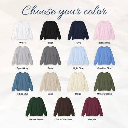A display of crewneck sweatshirts in various colors, including white, black, navy, and light pink. The image includes the text "Choose your color" and color names like "Sport Grey", "Grey", and "Indigo Blue".