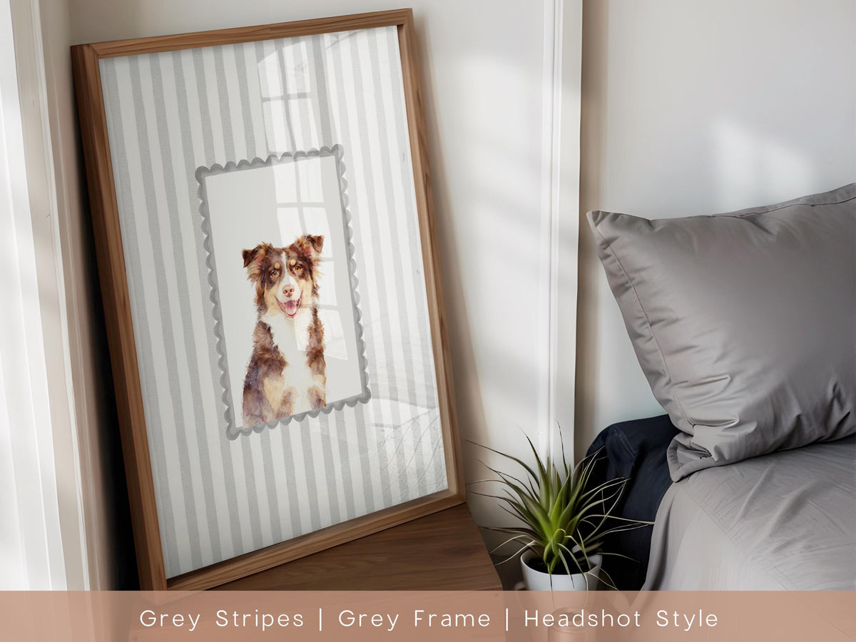 A framed print featuring a watercolor-style headshot of a dog. The dog has brown and white fur and is set against a gray and white striped background. The frame is wood-toned, and the print is labeled "Grey Stripes | Grey Frame | Headshot Style."