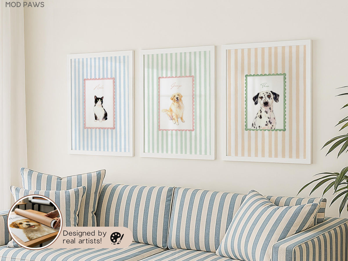 Three framed pet portraits hang on a wall above a striped sofa. The portraits feature a cat, a golden retriever, and a Dalmatian. Each image is set within a decorative frame, adding a touch of elegance to the room.