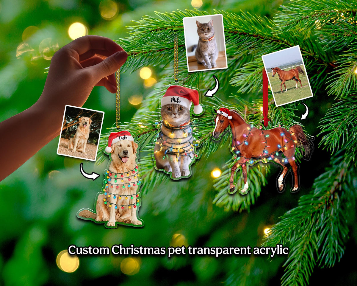 Christmas tree ornaments featuring pets, including a dog, cat, and horse, each adorned with festive lights and Santa hats. The ornaments are transparent acrylic and include small photos of the pets. The text "Custom Christmas pet transparent acrylic" is at the bottom.