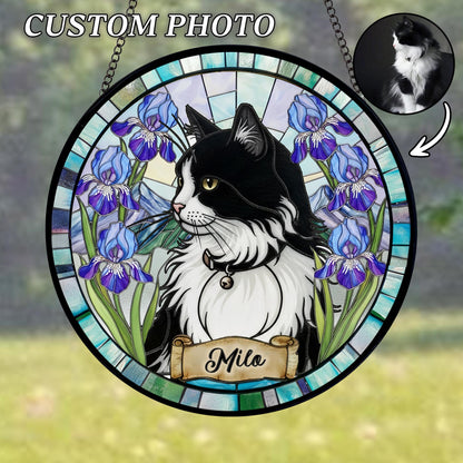 Round stained glass window featuring a black and white cat with blue iris flowers. The cat has a name tag that says "Milo". The words "CUSTOM PHOTO" are at the top. A small black and white photo of the cat is in the upper right corner.